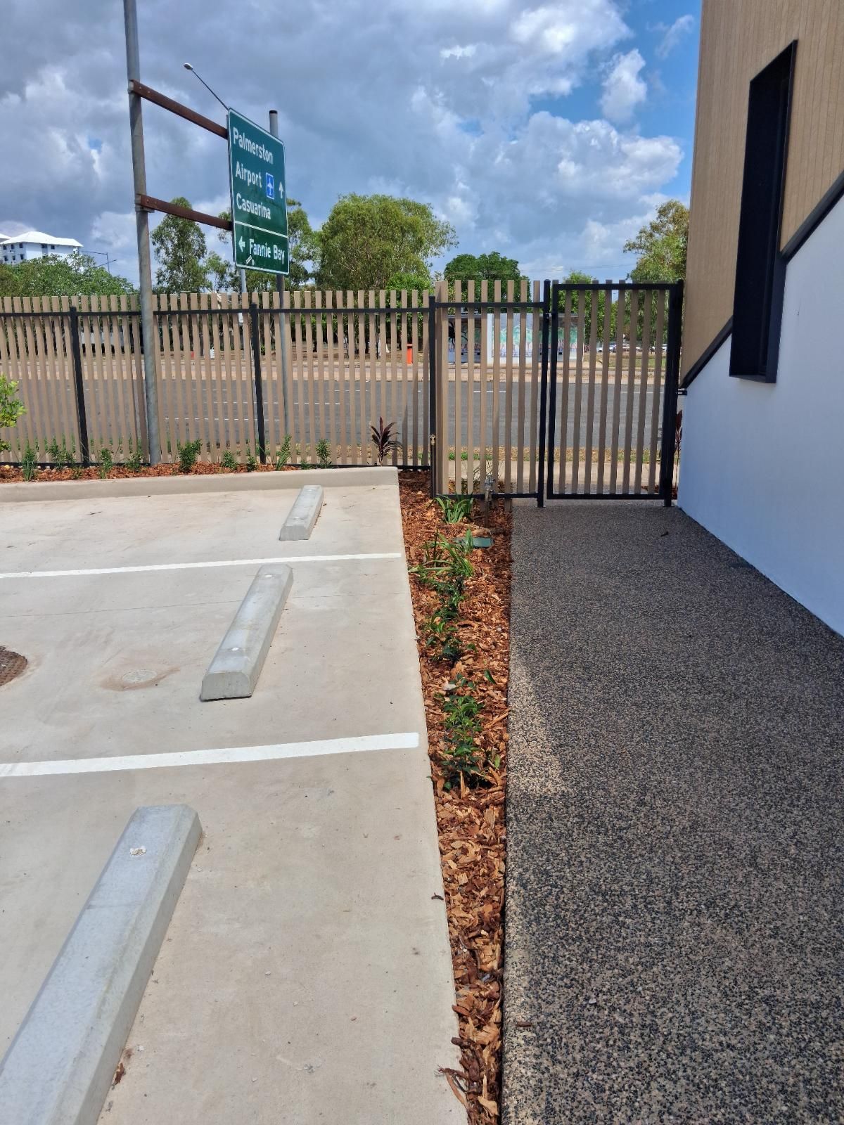 Finished landscaping project featuring neatly arranged outdoor area with plants and paving in Parap NT