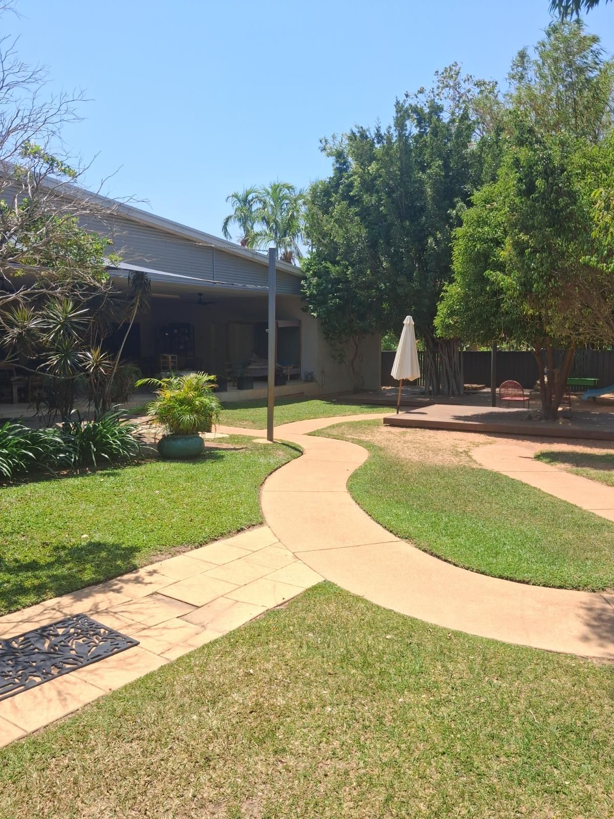 Completed outdoor landscaping area in Leanyer NT after service by iScape NT, featuring tidy and landscaped surroundings.