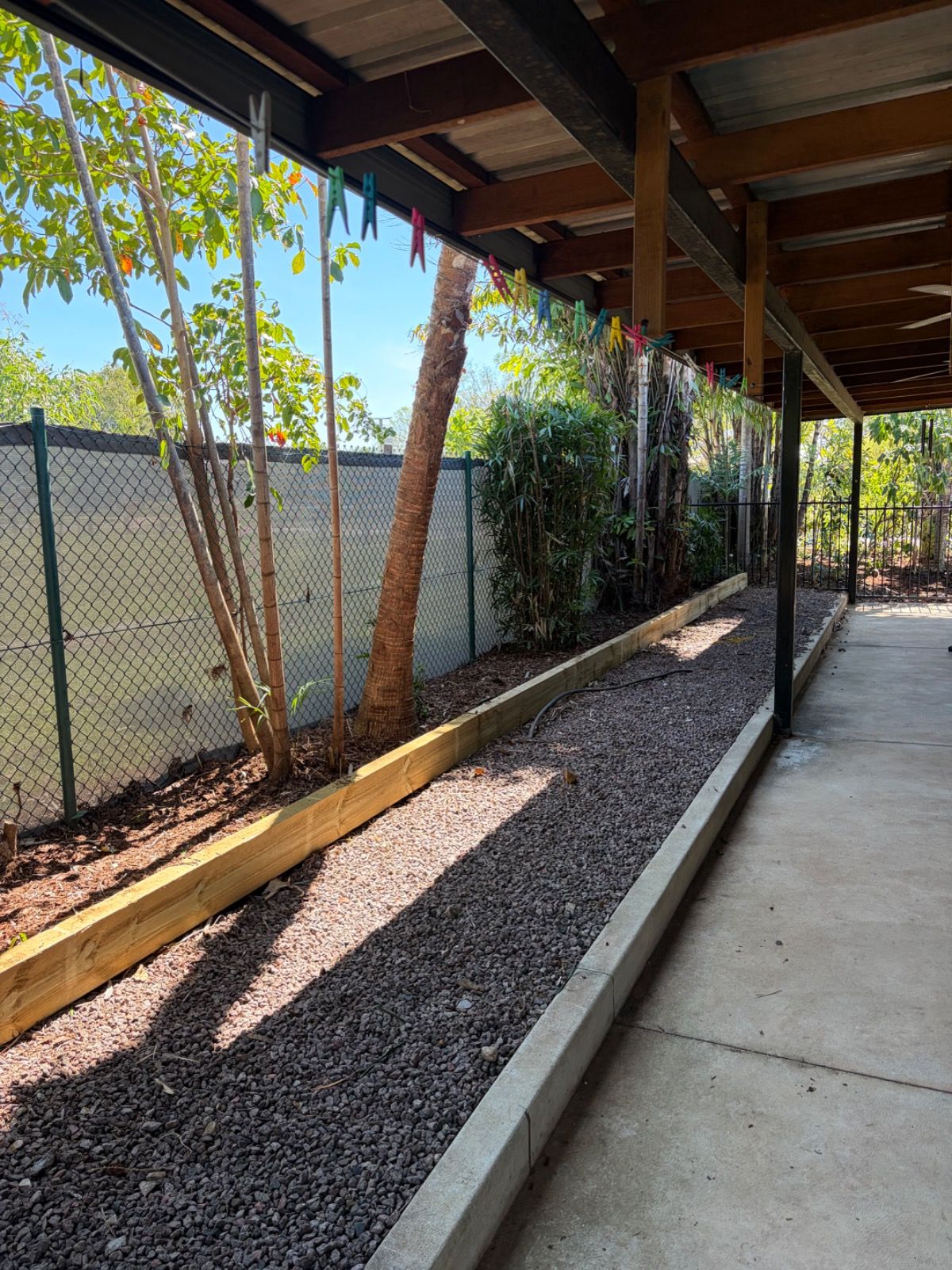 Outdoor landscape work site showing vegetation and garden area in Bakewell by iScape NT